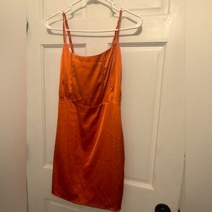 Dress color: Orange, size M, Brand:Fashion Nova.